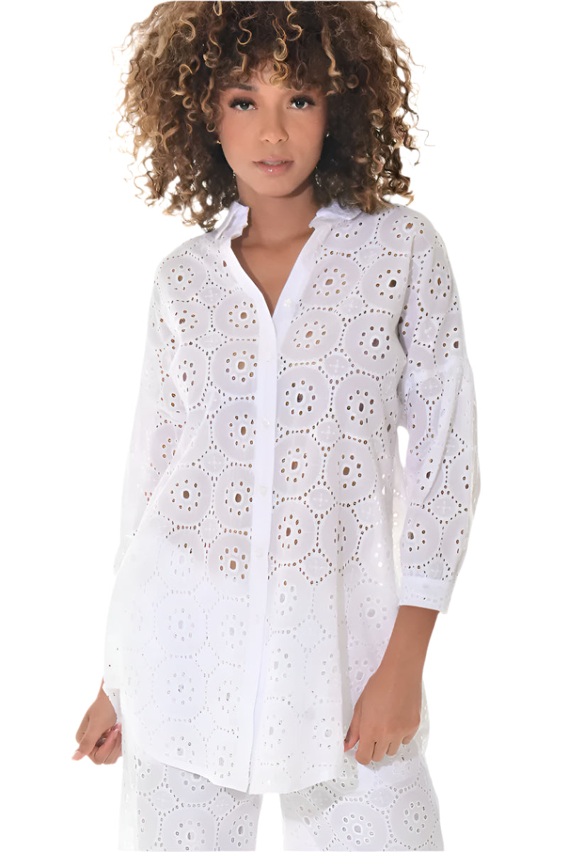 Woman wearing a white lace shirt on a white background