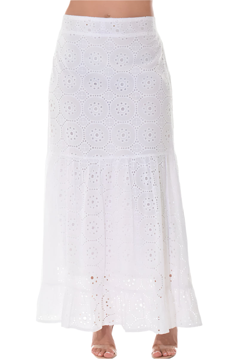 A white, long length, embroidered eyelet cotton skirt with a ruffled hem.