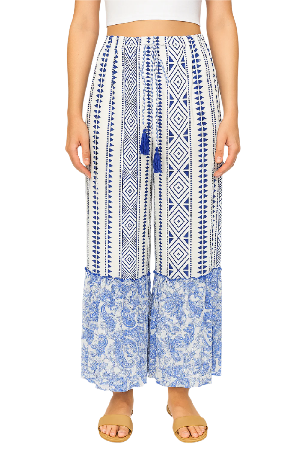 Woman wearing a blue and white patterned skirt on a white background