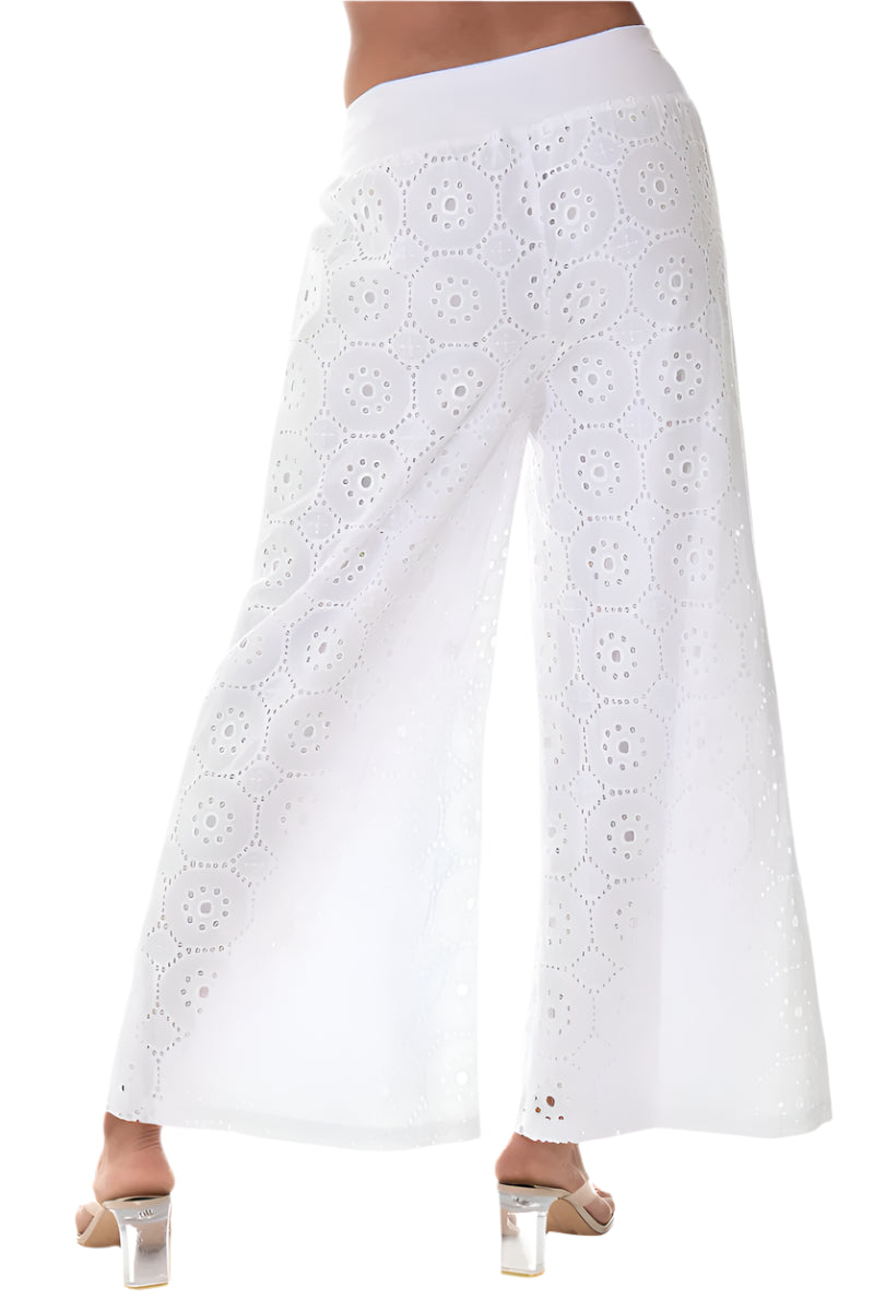 White wide-leg pants with eyelet details on a white background